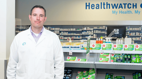 a man standing in front of a counter