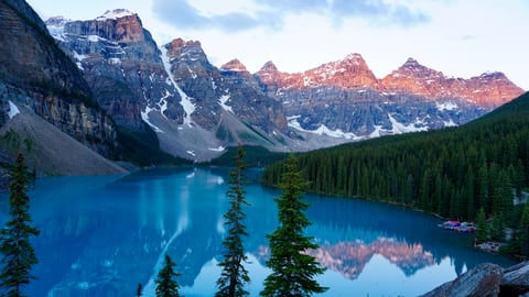 a lake with a mountain in the background