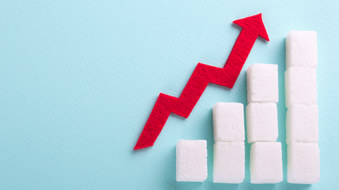 cubes of while sugar in increasingly high stacks