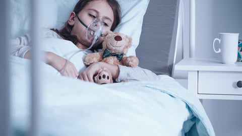 a person lying on a bed