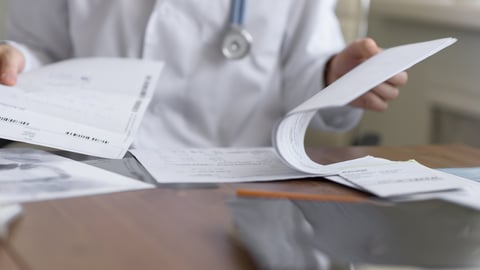 a person holding a piece of paper