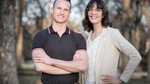 a man and a woman posing for a picture