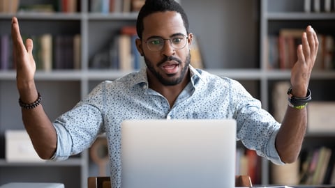 a man using a laptop computer