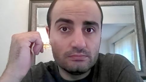 a man looking at the camera