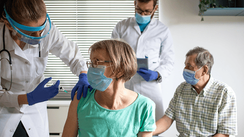 patients getting vaccinated at a COVID clinic