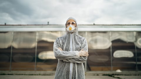 a person standing in a parking lot