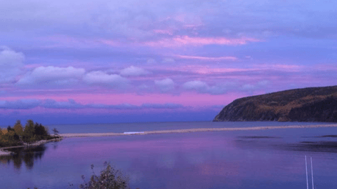 a sunset over a body of water