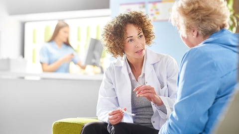 Pharmacist talking with a patient