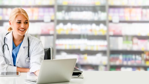 Pharmacy using a laptop