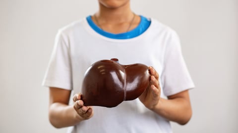 Kid holding a liver