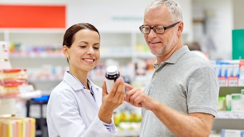 Pharmacist consulting with a patient