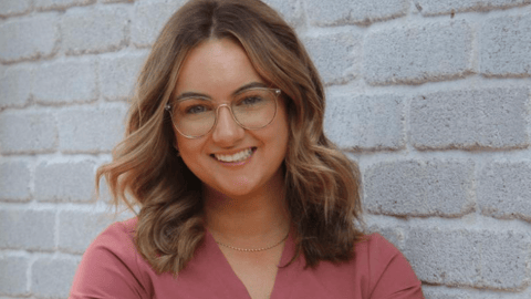 Picture of young white woman wearing pink scrubs