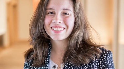 Christine Vaccaro headshot in a blazer