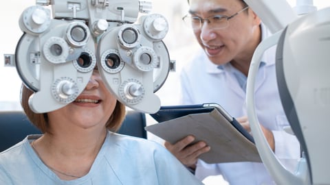 Woman getting an eye exam