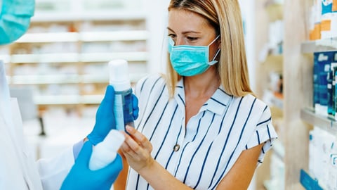 Woman chatting with pharmacist