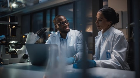 Two scientists chatting