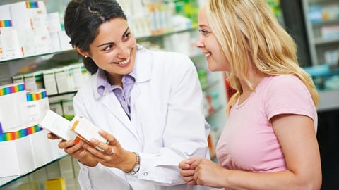 Pharmacist helping a patient