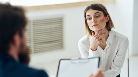 Woman talking to male interviewer