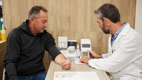 Pharmacist helping a patient