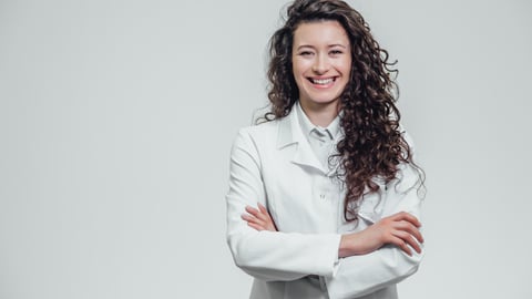 A smiling female pharmacist