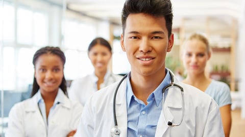 Young group of doctors smiling