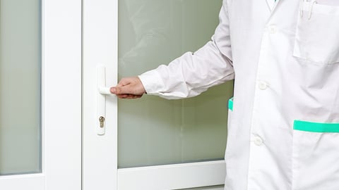 a man standing in front of a door