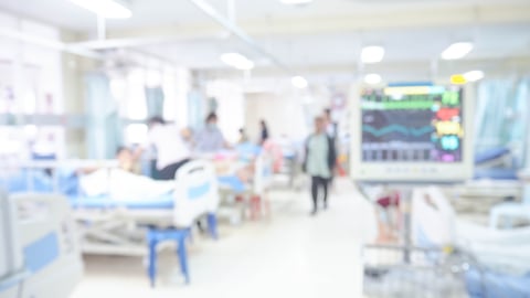 a blurry photo of a hospital ward