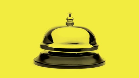 Hotel bell with yellow background