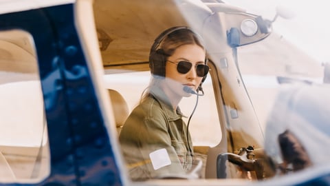 Woman piloting a small plane