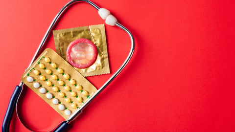 Stethoscope with a condom and birth control pills