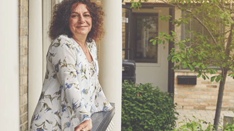 Woman standing on a balcony