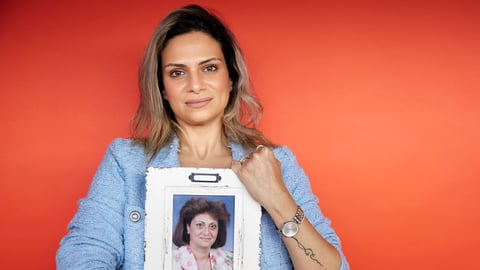 Picture of Nancy Banoub holding a photo 