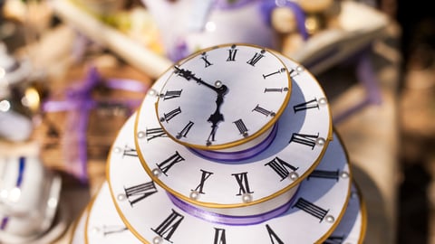 A cake that looks like a stack of clocks