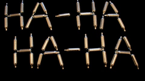 metal-canisters-on-black-background