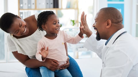 male-black-doctor-high-five-with-black-girl-with-black-woman