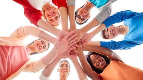 women-diverse-circle-together-hands-up