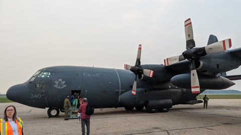 A military plane on a tarmac