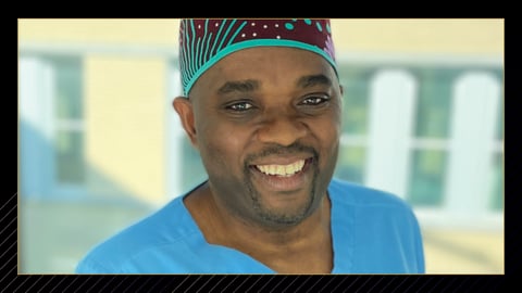 Black male doctor in scrubs