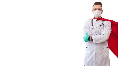 doctor in white coat and mask wearing a bright red cape and looking strong