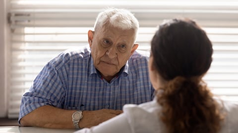 senior patient, white man, talking to female pharmacist