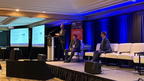 Abhi Kalra delivering remarks at IHE Connectation in Toronto on Feb. 4, 2025.