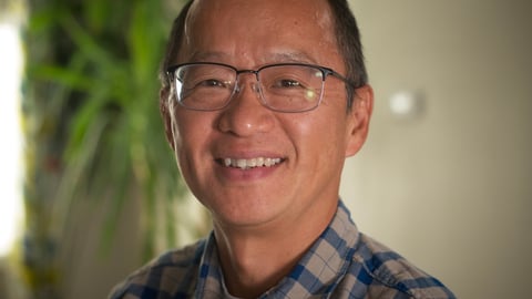 Smiling man with glasses