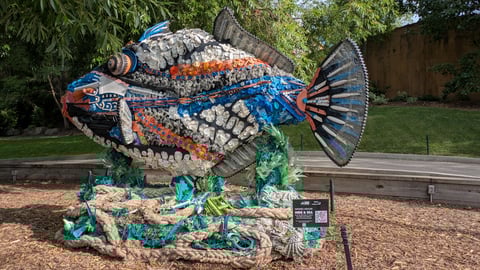 A fish sculpture made of recovered ocean debris