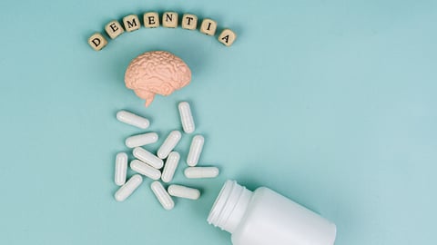 A bottle of pills spilling out