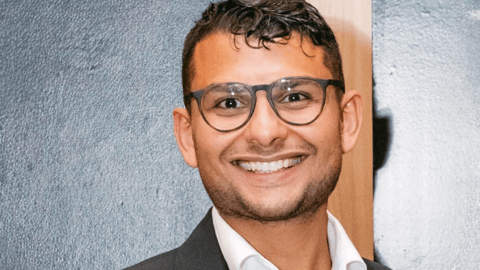 Samier smiling for a photo