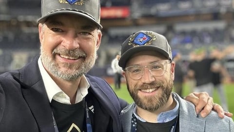 The Blue Jays' orthopedic surgeon Dr. Jason Smith and lead physician Dr. David Lawrence, on the right, at a Blue Jays game.
