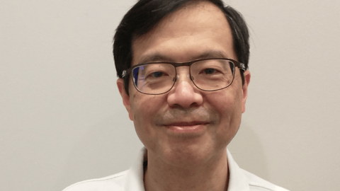 Dr. Adam Chen smiling