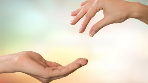 One empty hand giving to another hand