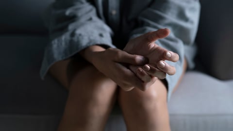 Female hands showing stress