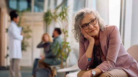 A woman waits at a doctor's office.